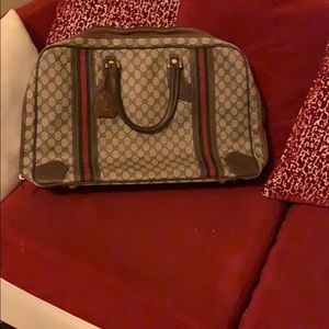 Small Gucci carry on luggage
